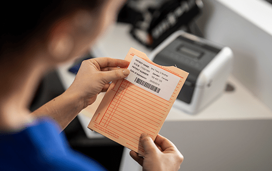 brother-bde-1j026076-102-einzeletikettenrolle-76mm-x-26mm-weiss